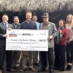 Check presentation to Panama City Rescue Mission from a Bay Helping Bay event