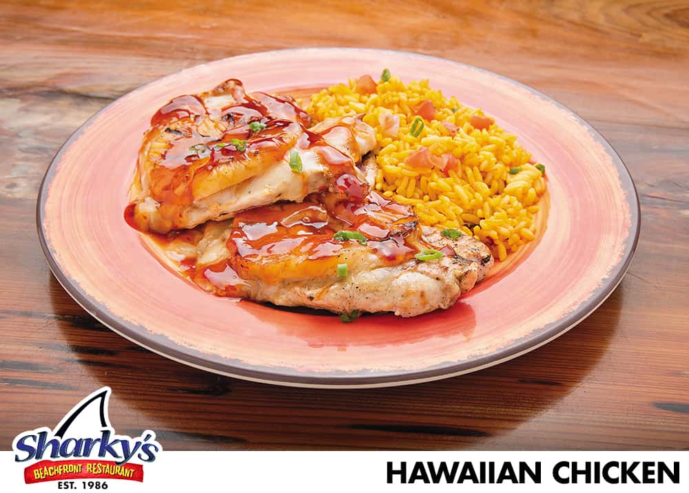 Hawaiian Chicken is made with grilled chicken breasts with a Teriyaki glaze, Monterey Jack cheese & grilled pineapple, served with rice.